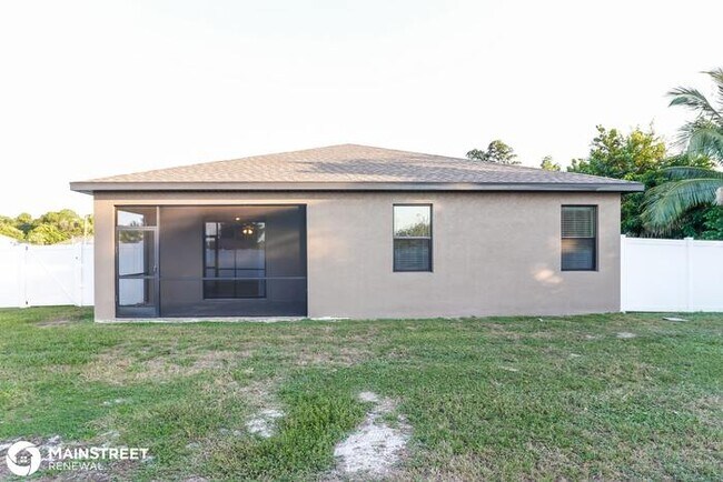 Building Photo - 723 SW 6th St, Cape Coral, FL 33991