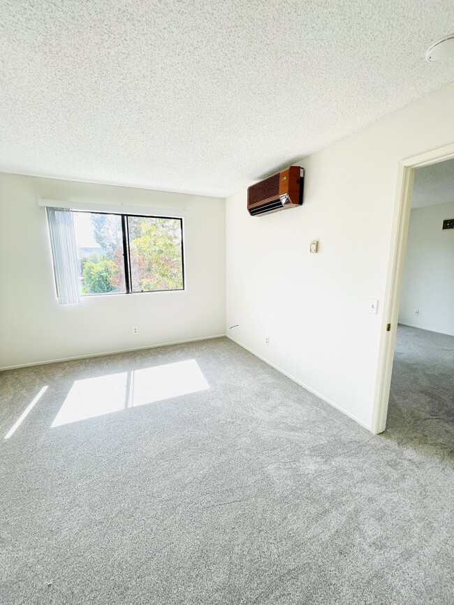 Bright Master Bedroom with walk in closet and full bath - 6330 Genesee Ave