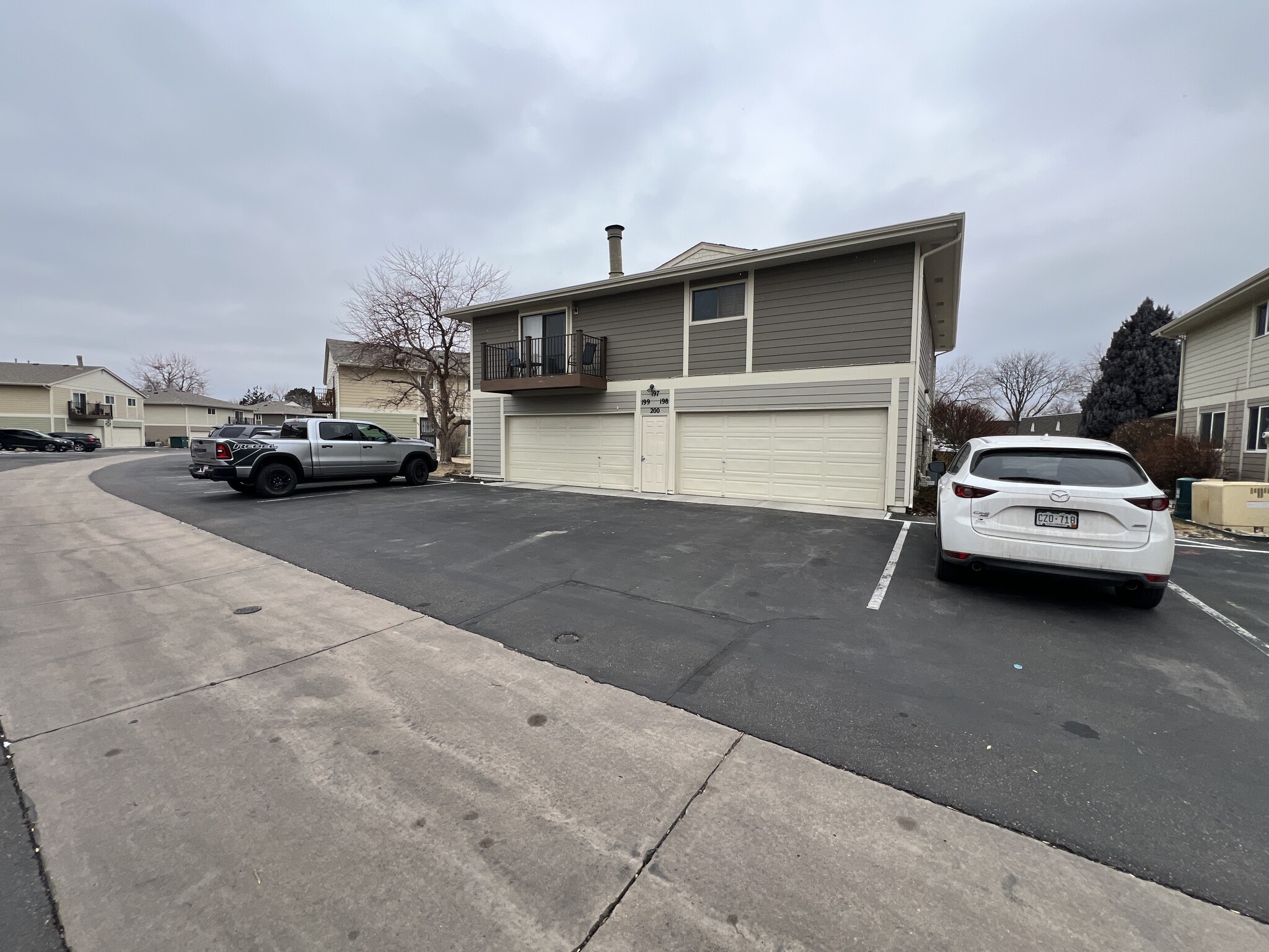 Back of unit - garage and parking area - 6650 E Arizona Ave