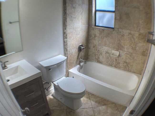 Building Photo - Furnished 2BR Condo with Dual Primary Suit...