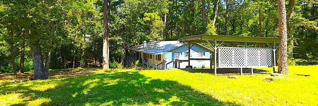 Building Photo - Breathtaking Lake View Retreat with Modern Updates!