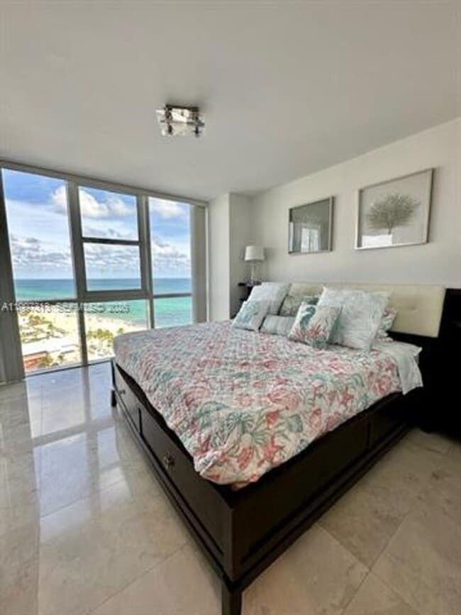 Building Photo - 18201 Collins Ave