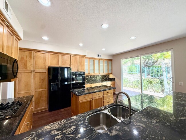 Building Photo - Gated 4 Bedroom 3 1/2 Bath Two Story Home