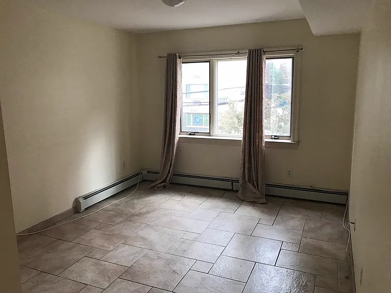 Building Photo - 142-37 38th Ave