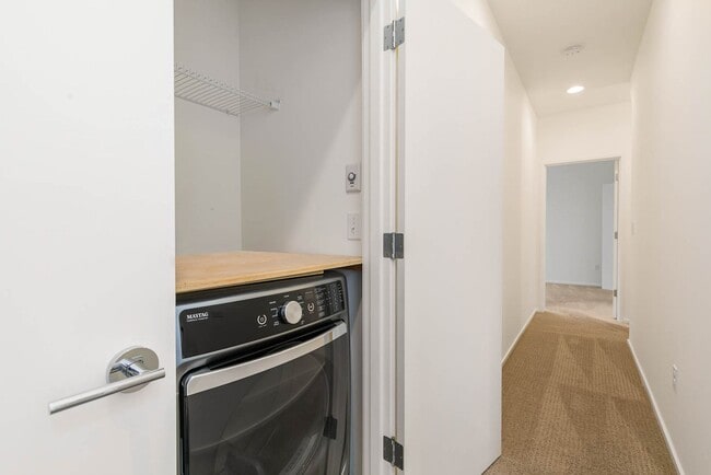 Building Photo - 3 Bedroom Modern Industrial Townhome with City Views & Rooftop Oasis
