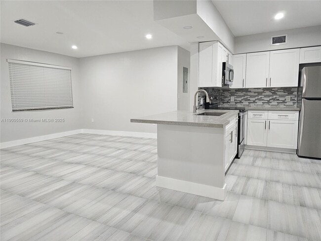 Building Photo - 1680 NW 128th St