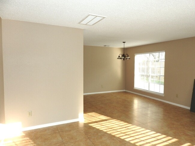 Building Photo - 3015 Cotter Lake Cir