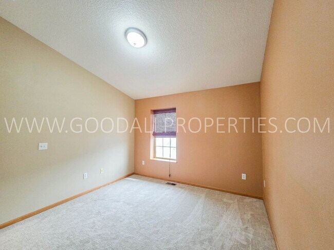 Building Photo - Bright & Spacious Waukee Townhome Near Dining, Shopping & Entertainment and attached 2-car garage