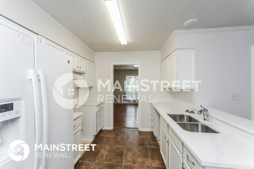 Building Photo - 8849 Woodmark Dr