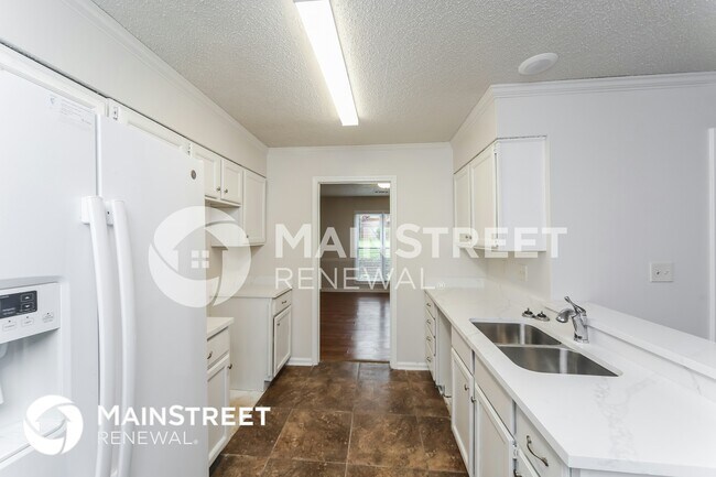 Building Photo - 8849 Woodmark Dr