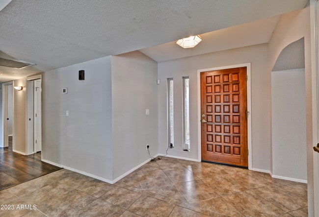 Building Photo - 6747 E Aire Libre Ln