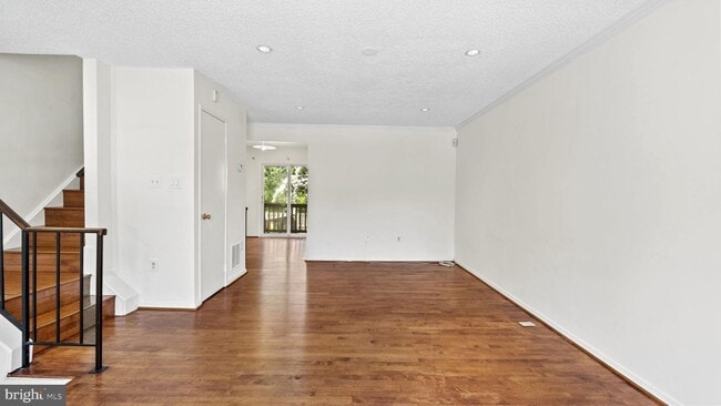 Building Photo - This stunning 3-bedroom, 2-bathroom interior townhome is sure to impress.