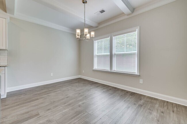 Building Photo - Beautifully maintained 4 / 2.5 home in Joh...