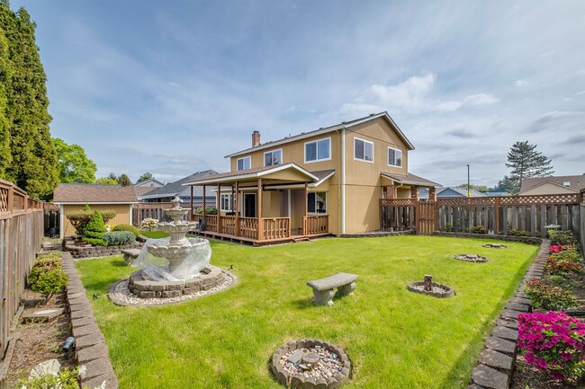 Building Photo - Spacious 5-Bedroom Home with Beautiful Bac...
