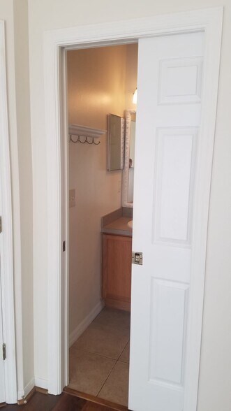 Hidden pull out door separating bedroom/ bathroom in master nedroom - 2306 S Bumby Ave