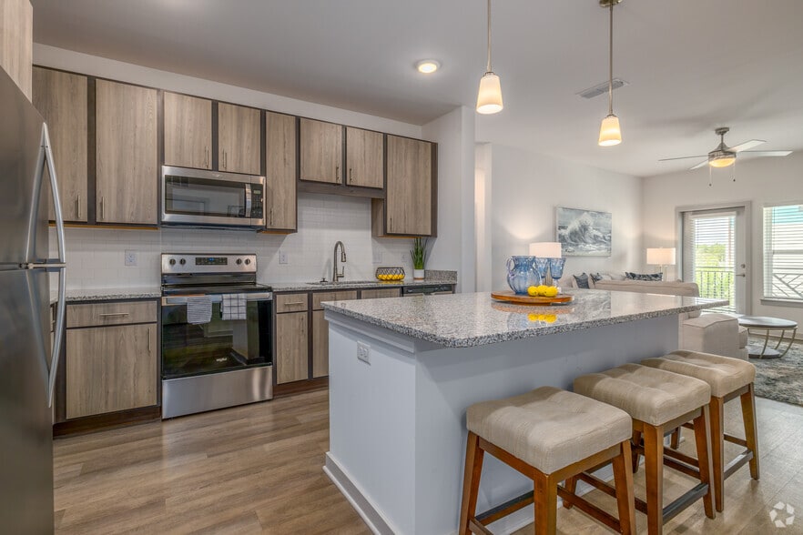 3BR, 2BA - 1,248SF - Kitchen - Preserve at Flagler Beach Apartments