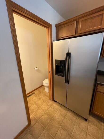 Half bathroom off kitchen - 152 Alydar Dr