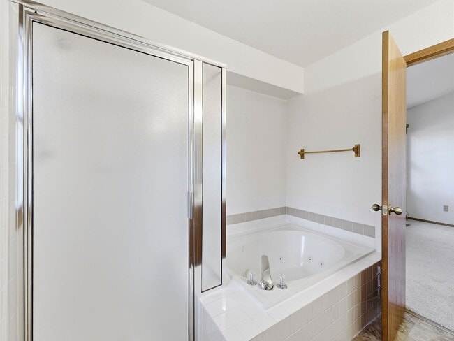 Building Photo - Beautiful Home with New Carpets, Fenced Yard, A/C, and Finished Basement!