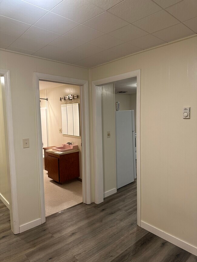 From bdrm-Looking at bathroom & entry into kitchen/dining - 231 NE 10th St