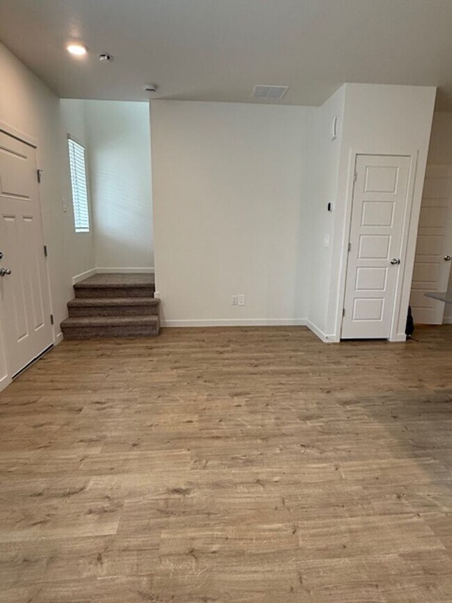 Building Photo - New 2 Bedroom Townhome + 2 Car Garage