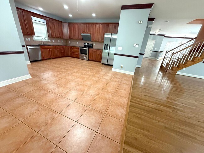 Building Photo - Beautiful Single-Family Home with Finished Basement & Fenced Backyard