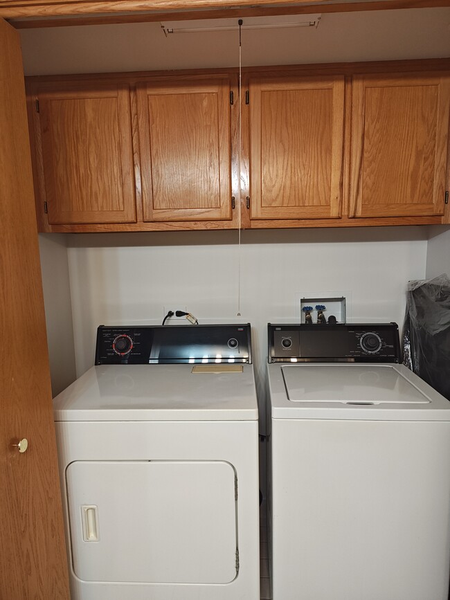 Dryer and washer in the bathroom - 5005 Warren St