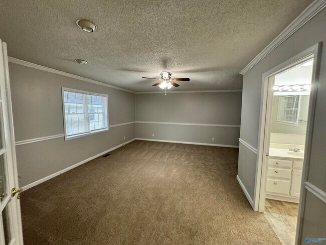 Building Photo - 3812 Melody Cir NE