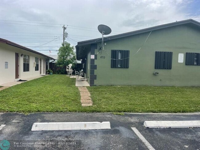 Building Photo - 670 NE 46th Ct