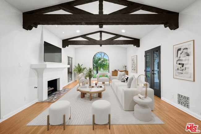 Building Photo - 260 S La Peer Dr