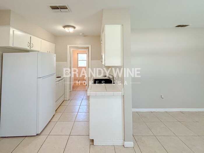 Building Photo - 6028 Flora Terrace