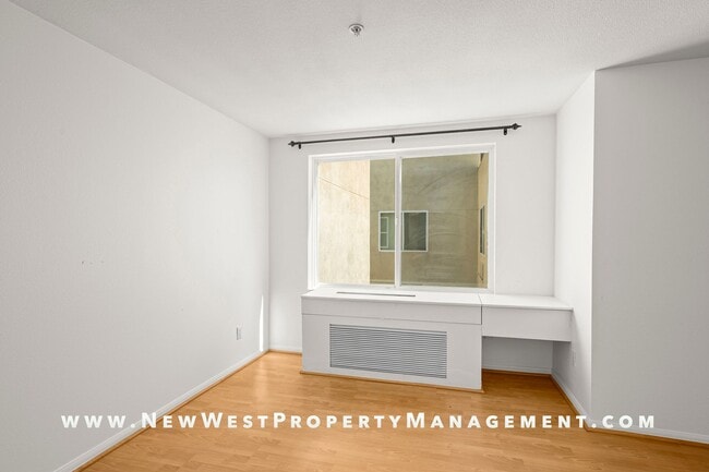 Building Photo - Charming Little Italy 1-Bedroom at Portico! Small Pet OK! Available Now!