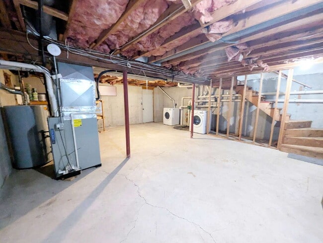 Building Photo - Stunning 2BR Townhome with Private Deck