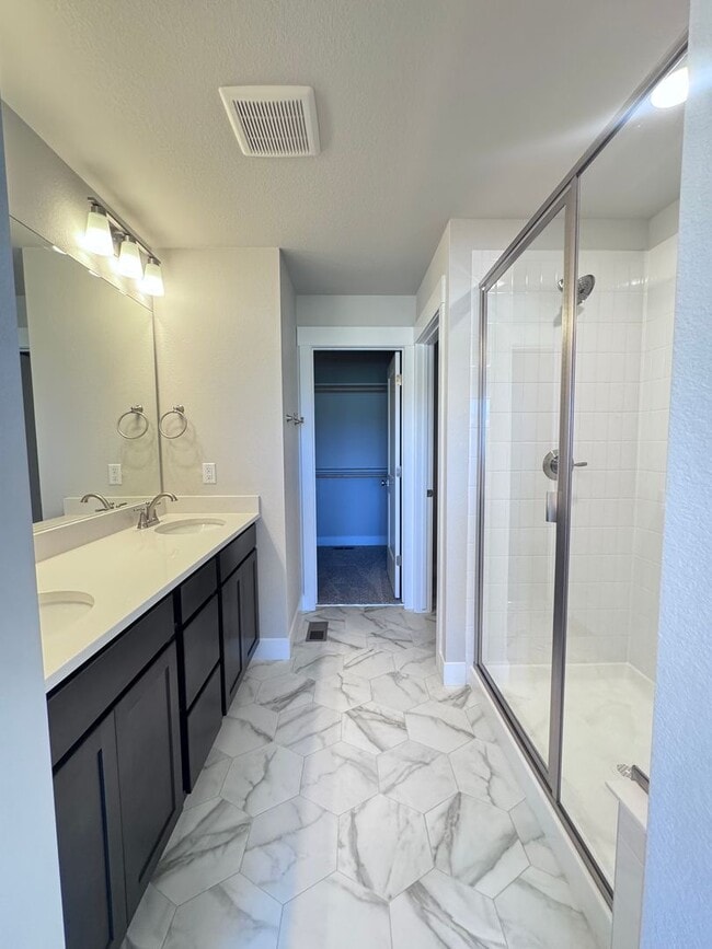 Building Photo - Sage Meadows II Townhomes — Lakeside Living Meets Modern Comfort!