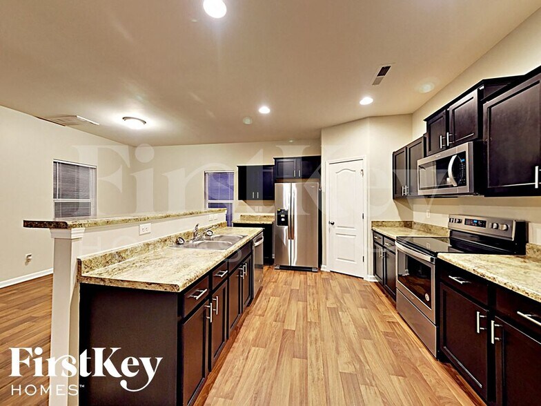 Building Photo - 6402 Springbeauty Dr