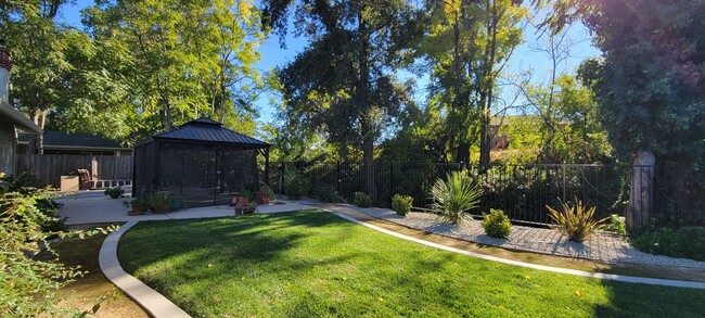 Building Photo - South Redding Home With Peaceful, Park-Lik...