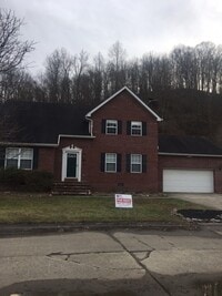 Building Photo - Four Bedroom Two and half bath brick home in Teays Valley