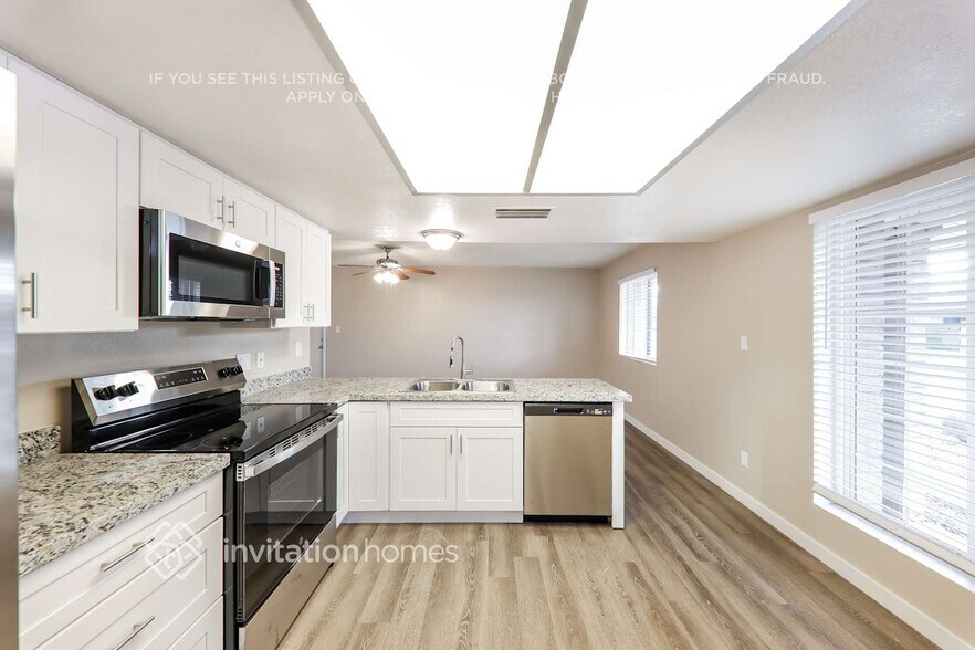 Building Photo - 1408 W Piute Ave