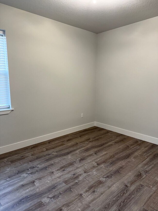 Building Photo - Brand new 3/2/2 with fenced in yard and a screened in porch! 50% off first month rent!