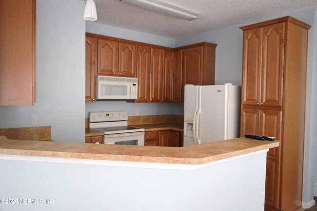 Building Photo - 7202 Deerfoot Cir