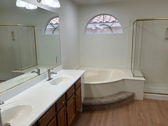 Building Photo - New flooring and freshly painted 4 bedroom...