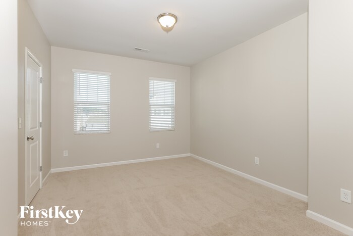 Building Photo - 304 Whispering Wind Way