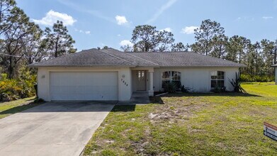 Building Photo - "Charming 3-Bed Oasis with 2 Baths - 1420 ...