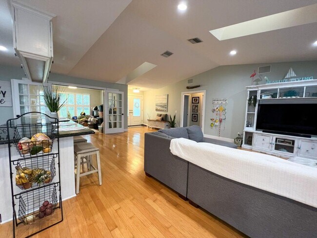 Building Photo - Palm City Home with Dock and Lift