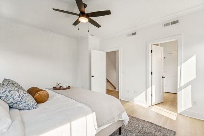 Building Photo - High-End 2BR Townhome | Rooftop Terrace + 2-Car Garage | 24-Unit Community