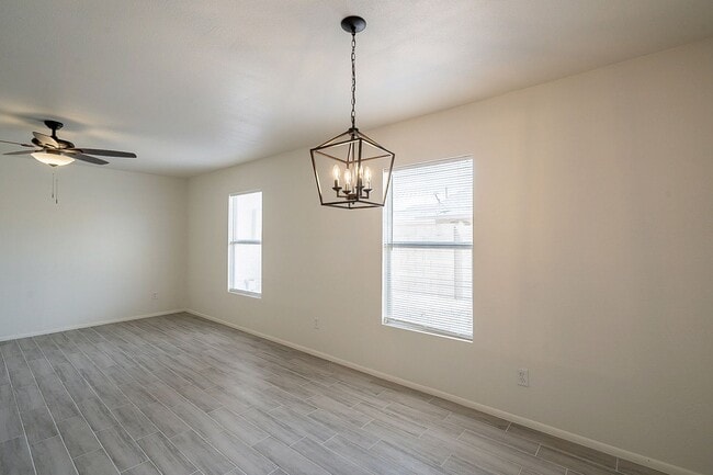 Building Photo - Updated home with large backyard & 2 car g...