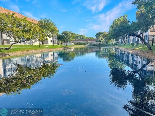 Building Photo - 6090 N Sabal Palm Blvd