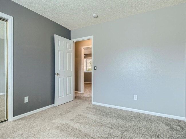 Building Photo - 1293 E 97th Ave