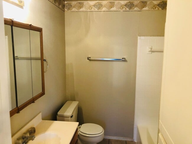 Building Photo - 3 bedrooms, 2 1/2 baths and a 2 car garage...