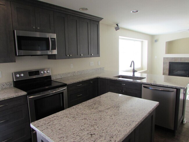 Building Photo - Beautiful 2-Story Home with 3-Car Attached...