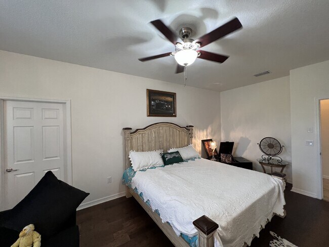 Building Photo - "Spacious 4-Bedroom Lutz Home with Elegant...